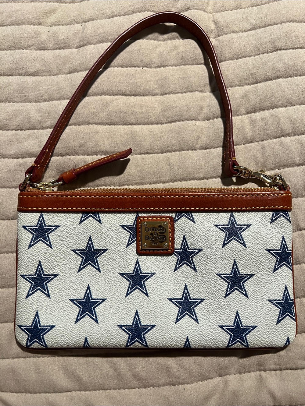 Dooney & Bourke White Wristlet with Navy Star Print and Brown Trim